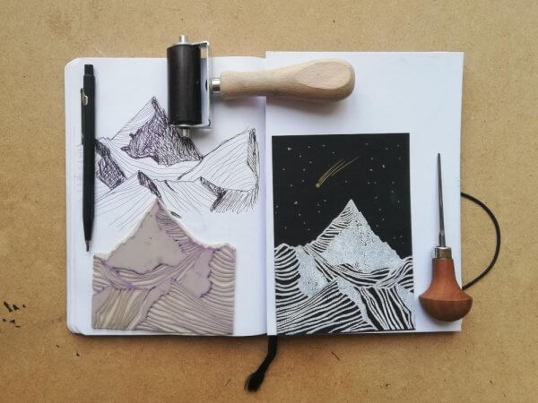 Sketchbook, Linotools and Linosheet with the Mountain and hand printed Card