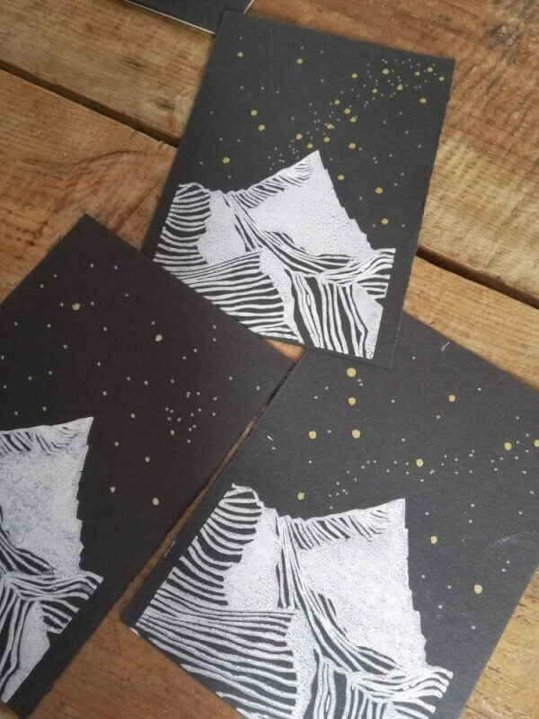Christmas Card Mountain with Snow and golden Stars